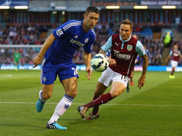 Gary Cahill of Chelsea is closed down by Matt Taylor