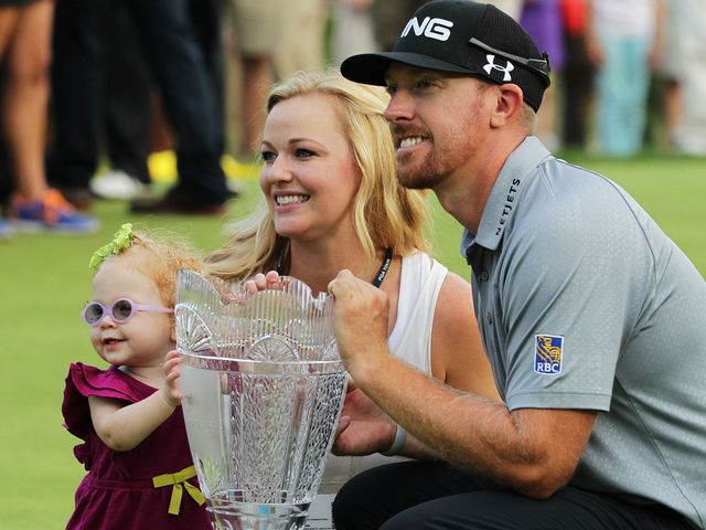 Hunter Mahan celebrates with wife Kandi and daughter Zoe