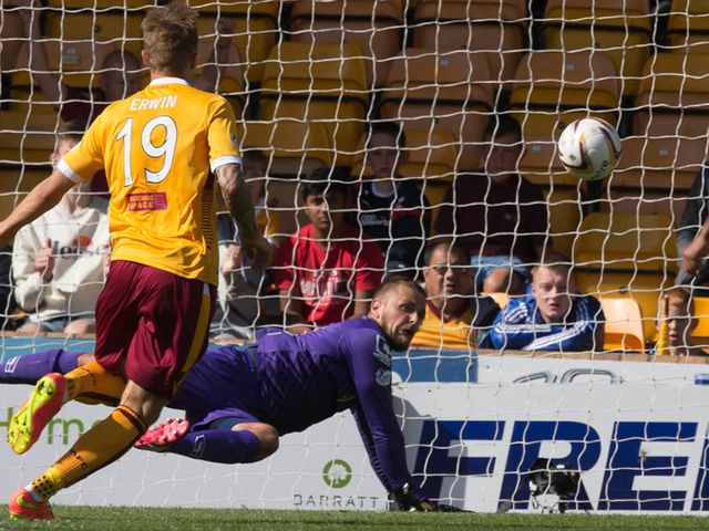 St Mirren goalkeeper Marion Kello is beaten by Motherwell's Lee Erwin