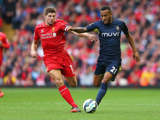 Ryan Bertrand is closed down by Steven Gerrard