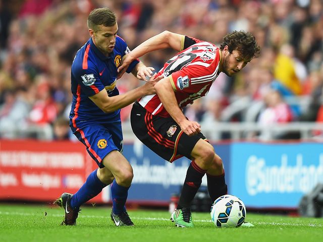 Will Buckley is closed down by Tom Cleverley