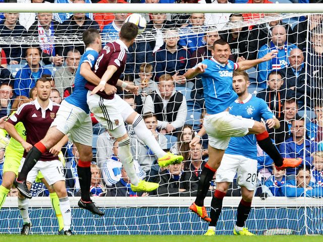 Danny Wilson scores the opening goal with a powerful header