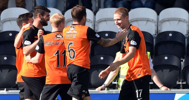 Chris Erskine (right) celebrates with team-mates after opening the scoring against St Mirren