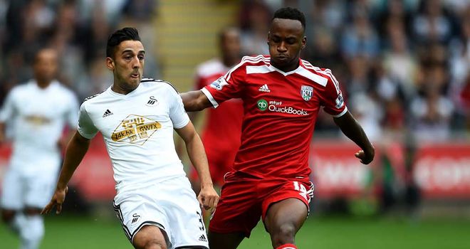 Neil Taylor in action for Swansea against West Brom