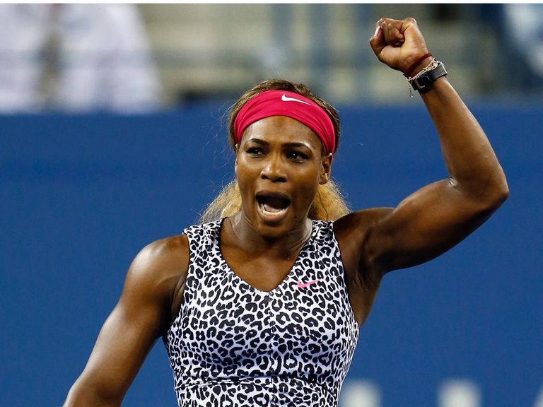 Serena Williams celebrates after reaching the semi-finals