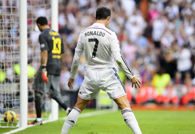 Real Madrid's Cristiano Ronaldo celebrates after scoring a penalty