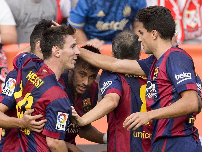 Neymar celebrates his goal with his Barcelona team-mates
