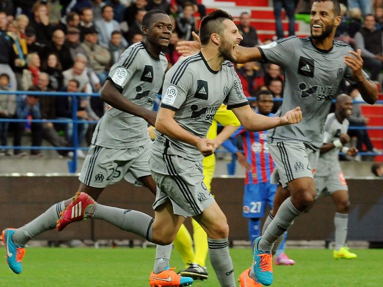 Andre-Pierre Gignac celebrates his late winning goal for Marseille