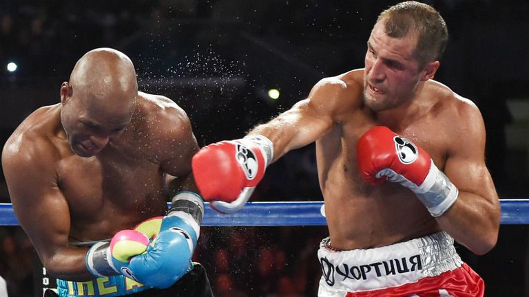 Sergey Kovalev punches Bernard Hopkins during their IBF, WBA, & WBO Light Heavyweight title fight at Boardwalk Hall Arena