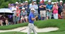 Scott closes on PGA leaders