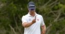 Scott moves into share of lead