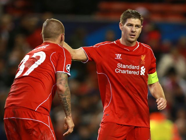 Liverpool's Steven Gerrard looks dejected after his team miss out on the next round
