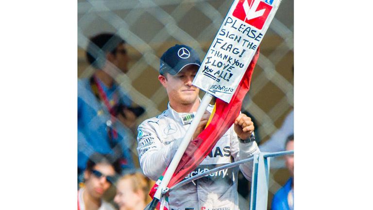 Richard Dyson via Facebook: Nico signs a fan's flag