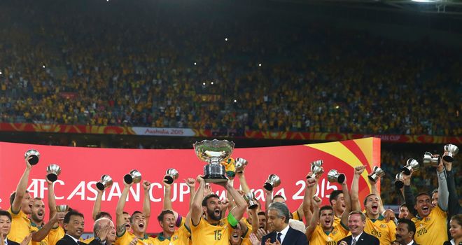 Mile Jedinak: Lifts the Asian Cup trophy for Australia