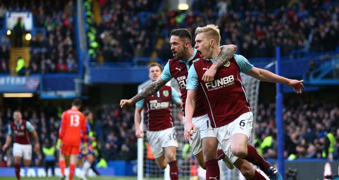 Ben Mee (R) is congratulated by team-mate Danny Ings after scoring Burnley's equaliser in the 81st minute