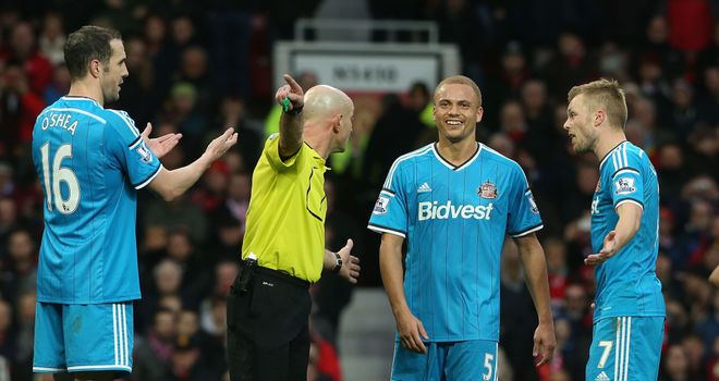 Wes Brown is wrongly sent off by Referee Roger East 