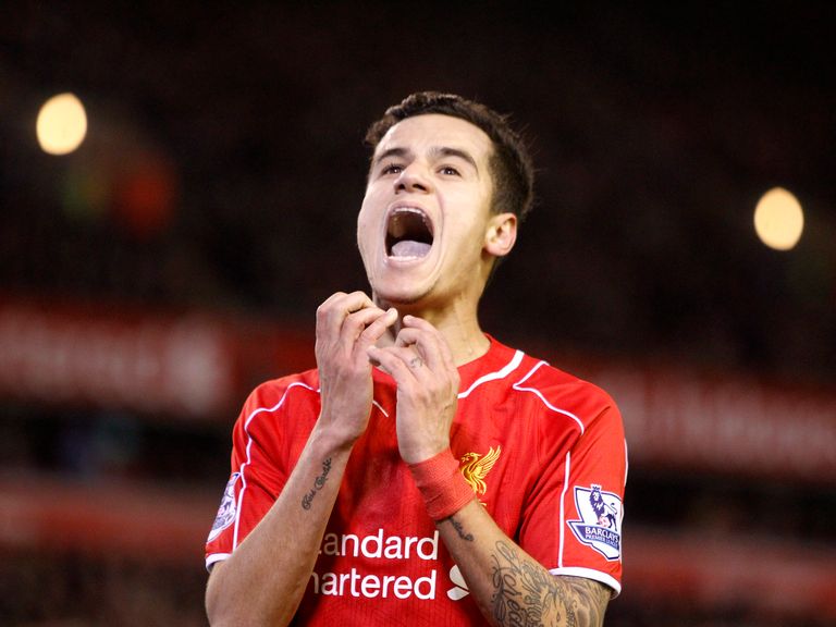 Liverpool's Philippe Coutinho welcomes the signing for Roberto Firmino 