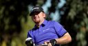 Holmes retains Doral lead