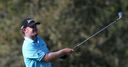 Doral ace extends Holmes' lead