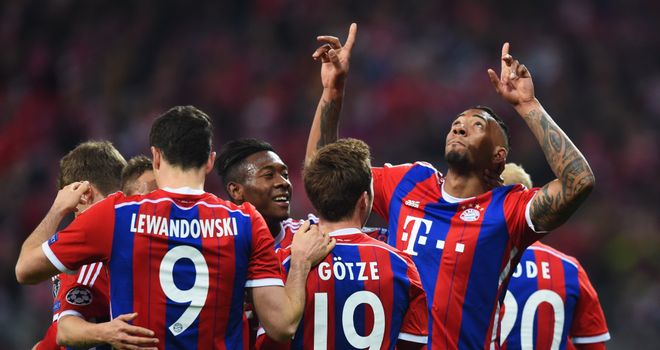 Jerome Boateng of Bayern Munich celebrates with team mates