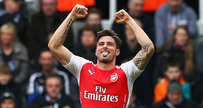 Olivier Giroud: Celebrates after scoring his first goal against Newcastle