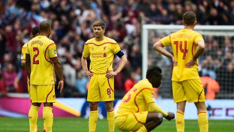The Liverpool players look deflated after their FA Cup semi-final defeat