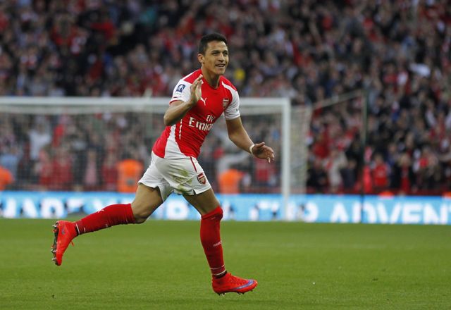 Alexis Sanchez celebrates his and Arsenal's second goal