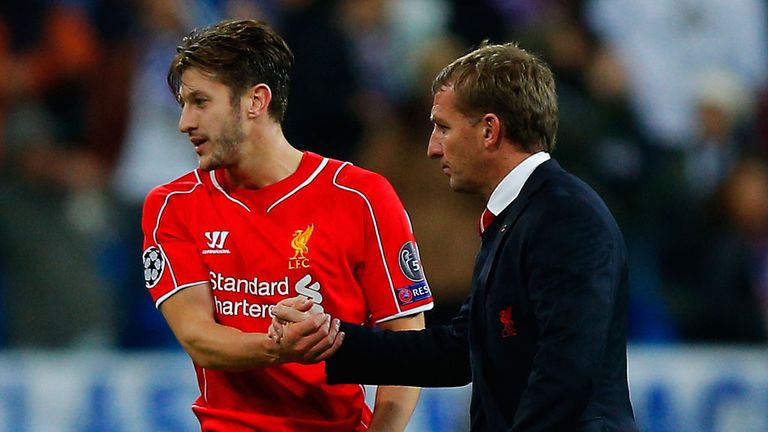 Adam Lallana (left): Delighted that Brendan Rodgers (right) is staying at Liverpool