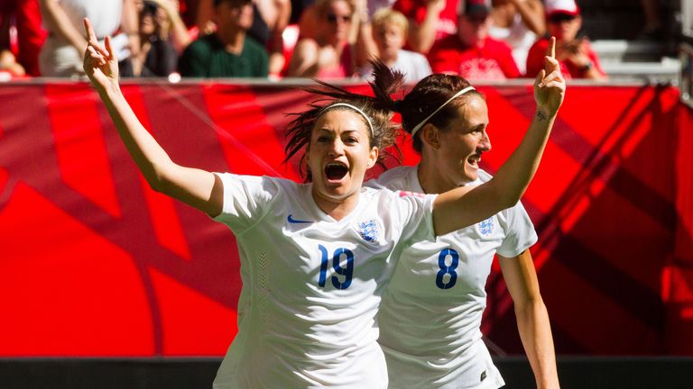 England's Jodie Taylor celebrates her opening goal against Canada with Jill Scott.