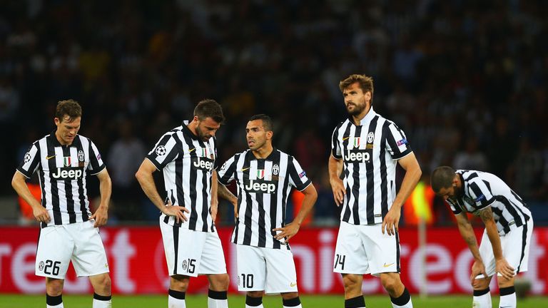 Juventus players look dejected after their defeat in the 2015 Champions League final
