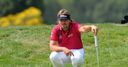 Dubuisson shines at home