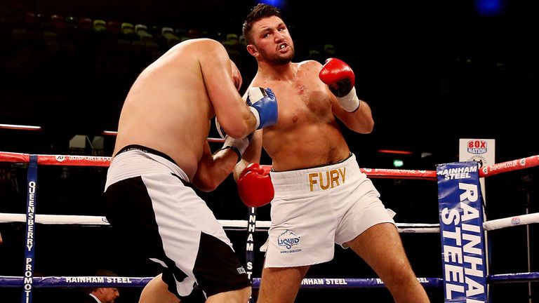 Fury will never step in to the ring to face cousin Hughie Fury (R)