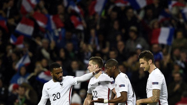Lacazette (left) and Giroud (right) are international team-mates for France