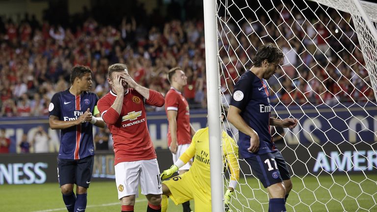 Wayne Rooney reacts to a missed chance against PSG at Soldier Field