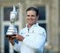 Zach Johnson poses with the Claret Jug after winning the 144th Open