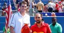 Isner beats injured Baghdatis