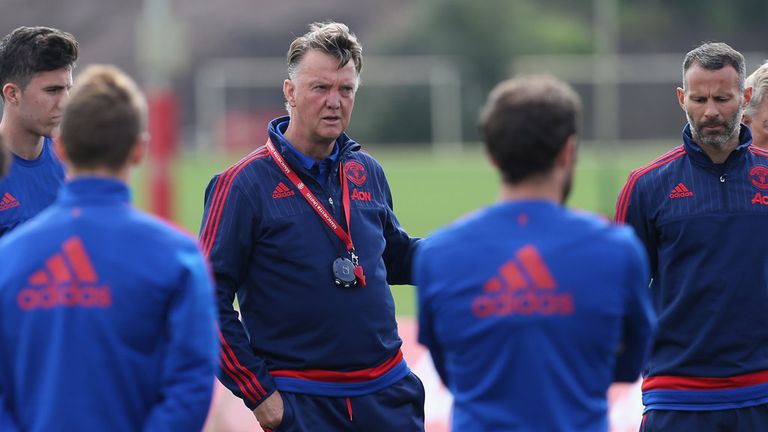 Louis van Gaal (middle) now manages Manchester United but was unavailable when Sir Alex Ferguson retired