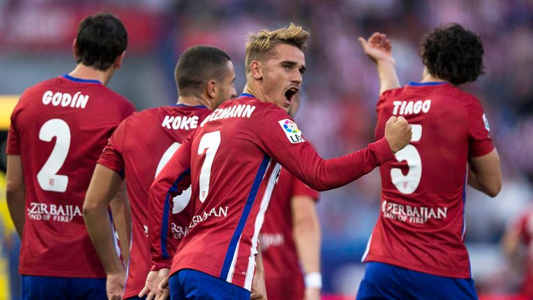 Antoine Griezmann celebrates scoring the winner against Las Palmas on the opening day of the campaign