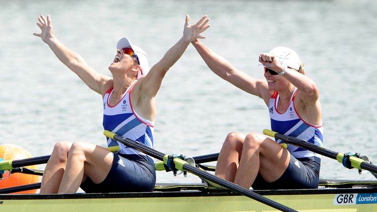 Anna Watkins (R) and Grainger celebrate winning gold at London 2012