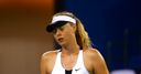 Sharapova plays down chances