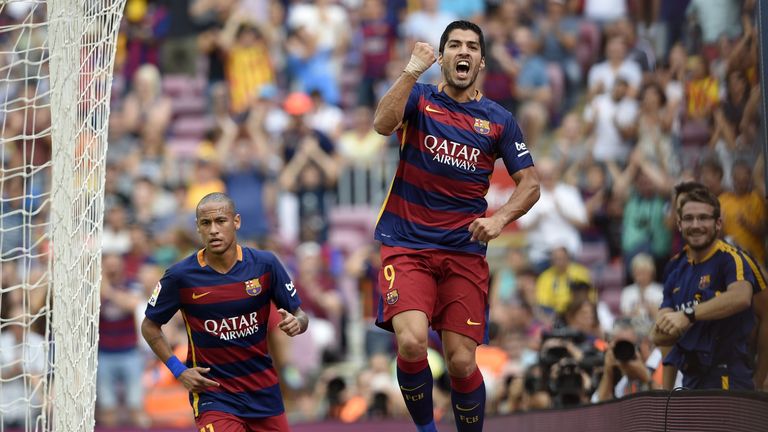 Luis Suarez (r) celebrates  after scoring against Las Palmas