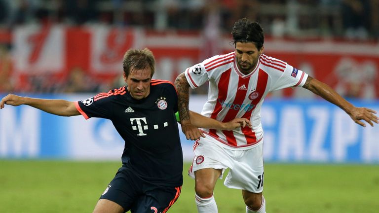 Philipp Lahm and Alejandro Dominguez tangle