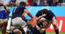 Scotland stumble into quarters