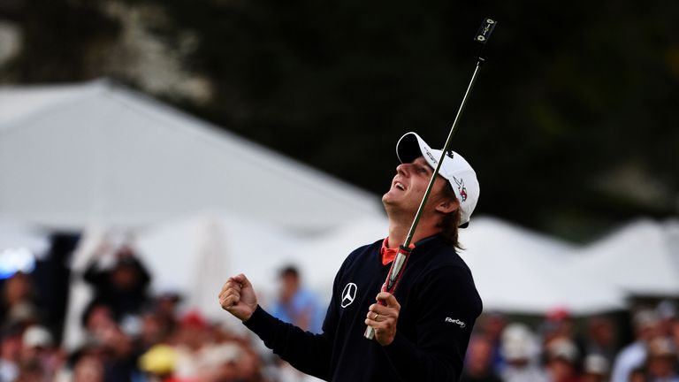 Emiliano Grillo celebrates after holing the winning putt for his maiden PGA Tour title