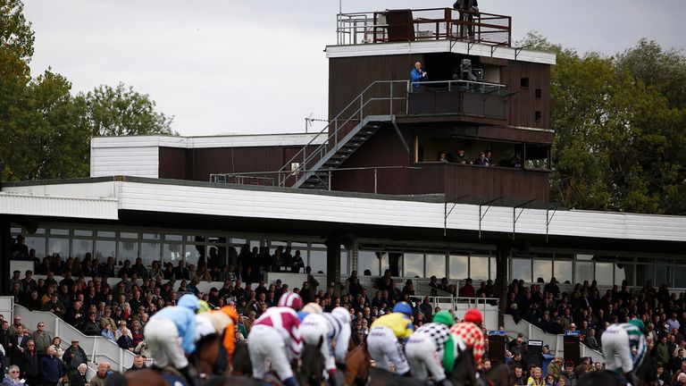 A general view as runners pass the grandstand at Huntingdon racecourse