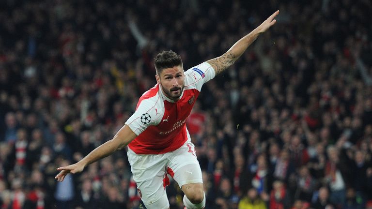 Olivier Giroud celebrates making the breakthrough against Bayern