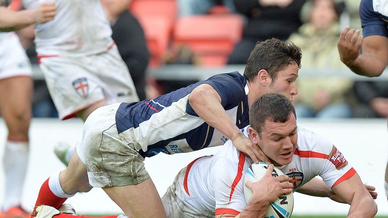 Brett Ferres goes over for a try in last year's game against France