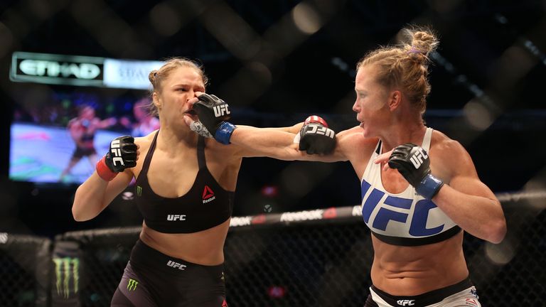 Holly Holm (right) shocked the world by defeating Ronda Rousey in November 2015
