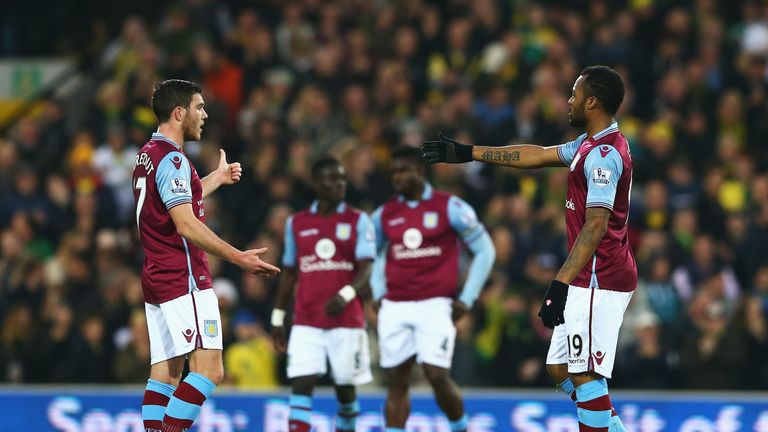 Jordan Veretout (left) and Jordan Ayew (right) of Aston Villa react after conceding
