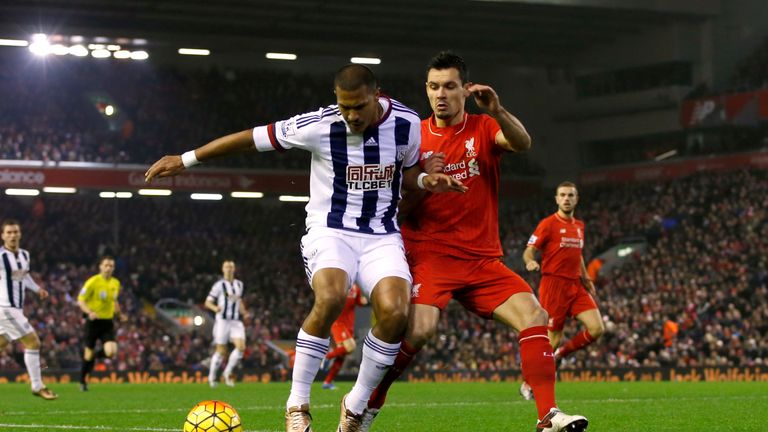 Liverpool's Dejan Lovren and West Bromwich Albion's Jose Salomon Rondon (left) battle for possession